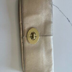 gold Coach clutch bag